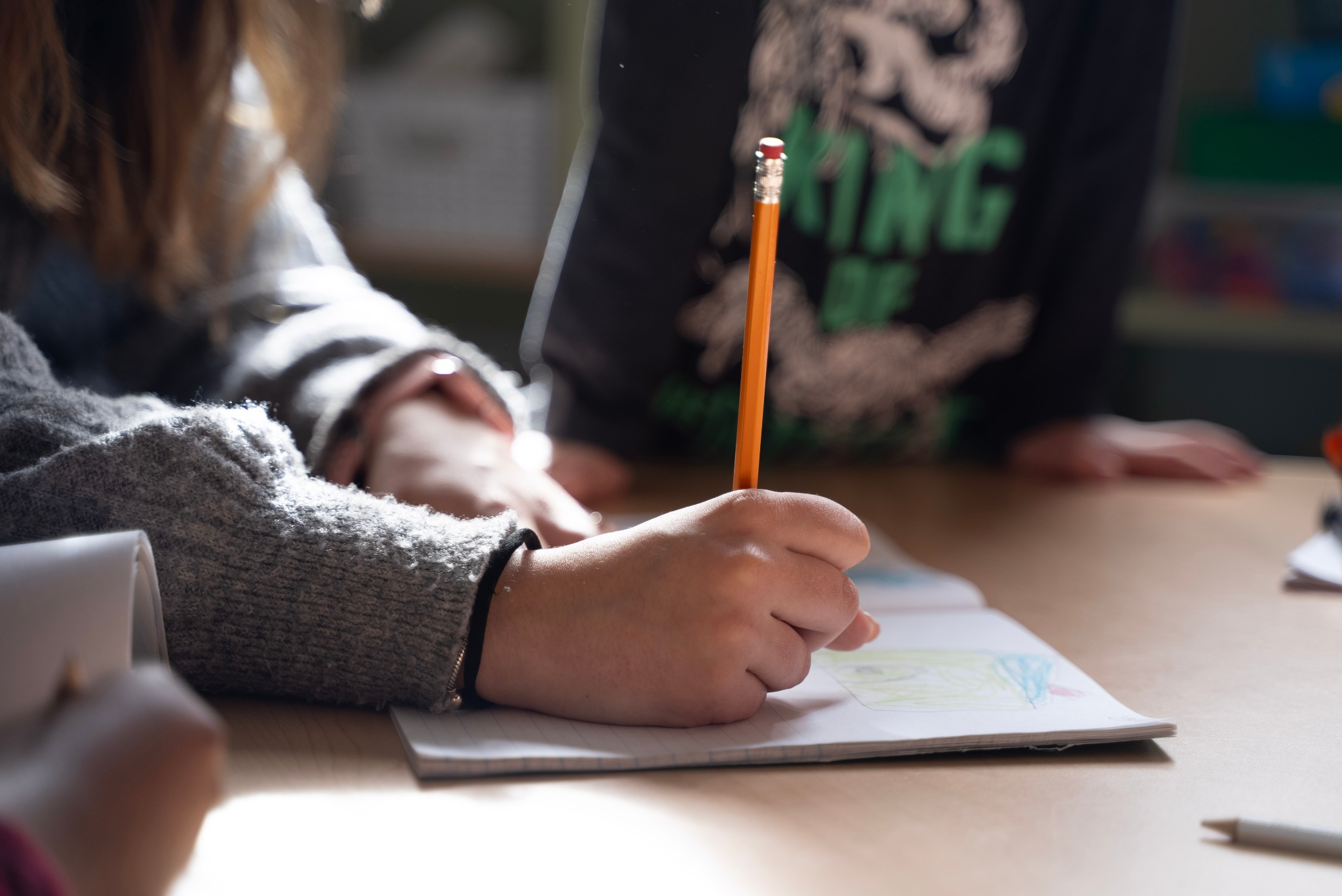 Image of a child reviewing thier report card